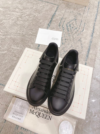 ALEXANDER MCQUEEN OVERSIZED LEATHER ZIPPER SNEAKERS - M019