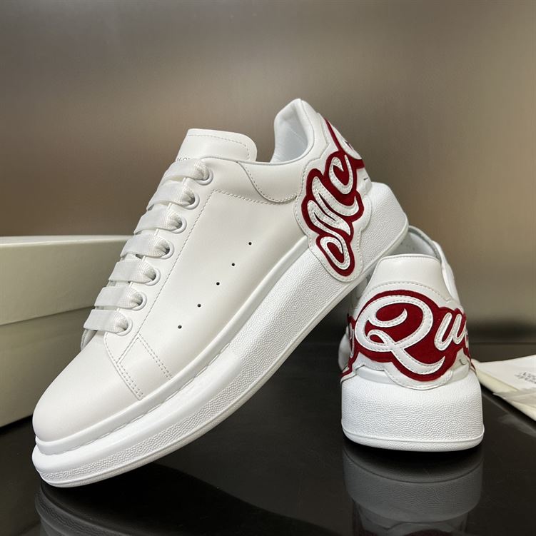 ALEXANDER MCQUEEN OVERSIZED LOGO-PATCH SNEAKERS - M057