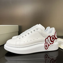 ALEXANDER MCQUEEN OVERSIZED LOGO-PATCH SNEAKERS - M057