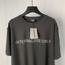 BALENCIAGA INTERNAL USE ONLY INSIDE-OUT T-SHIRT IN BLACK - Y022