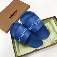 BURBERRY EMBOSSED LOGO SLIDES BUBBLEGUM BLUE - U024