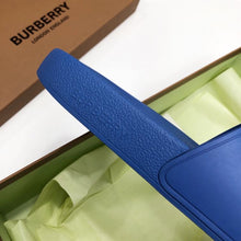 BURBERRY EMBOSSED LOGO SLIDES BUBBLEGUM BLUE - U024