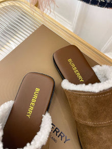 BURBERRY MONOGRAM DETAIL SHEARLING-LINED SUEDE MULES - U019