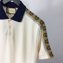 GUCCI POLO WITH INTERLOCKING G STRIPE - X050