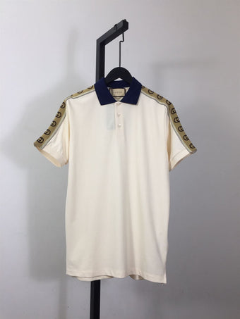 GUCCI POLO WITH INTERLOCKING G STRIPE - X050