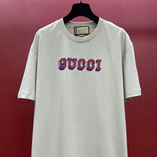 GUCCI T-SHIRT WITH GUCCI PRINT - X030