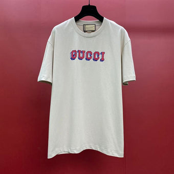 GUCCI T-SHIRT WITH GUCCI PRINT - X030