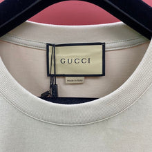 GUCCI T-SHIRT WITH GUCCI PRINT - X030