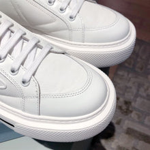 PRADA MACRO RE-NYLON AND BRUSHED LEATHER SNEAKERS - P071