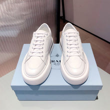 PRADA MACRO RE-NYLON AND BRUSHED LEATHER SNEAKERS - P071