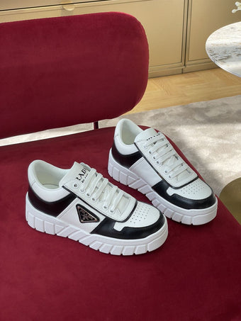 PRADA VOLUMINOUS SNEAKERS WHITE BLACK - P062