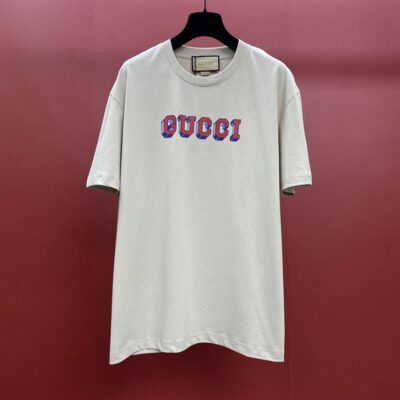 GUCCI T-SHIRT WITH GUCCI PRINT - X030