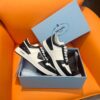 PRADA DOWNTOWN PATENT LEATHER SNEAKERS WHITE BLACK - P031