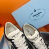 PRADA DOWNTOWN PATENT LEATHER SNEAKERS WHITE BLACK - P031