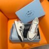 PRADA DOWNTOWN PATENT LEATHER SNEAKERS WHITE SILVER - P032