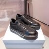 PRADA MACRO RE-NYLON AND BRUSHED LEATHER SNEAKERS - P070