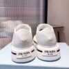 PRADA MACRO RE-NYLON AND BRUSHED LEATHER SNEAKERS - P071