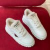 PRADA WHITE LEATHER AND SHEARLING SNEAKERS - P061