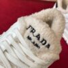 PRADA WHITE LEATHER AND SHEARLING SNEAKERS - P061