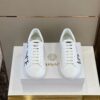 VERSACE LOGO PRINTED LOW-TOP SNEAKERS - UH032